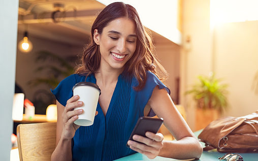 Woman smiling while on the phone