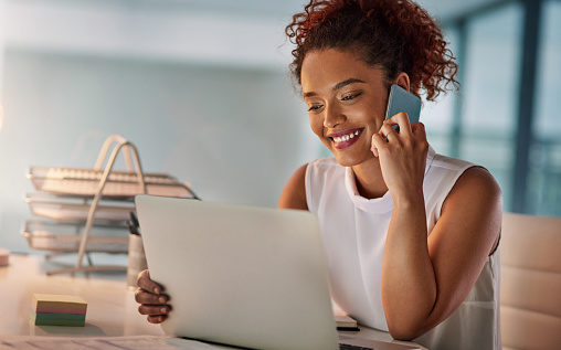 Woman smiling while on the phone